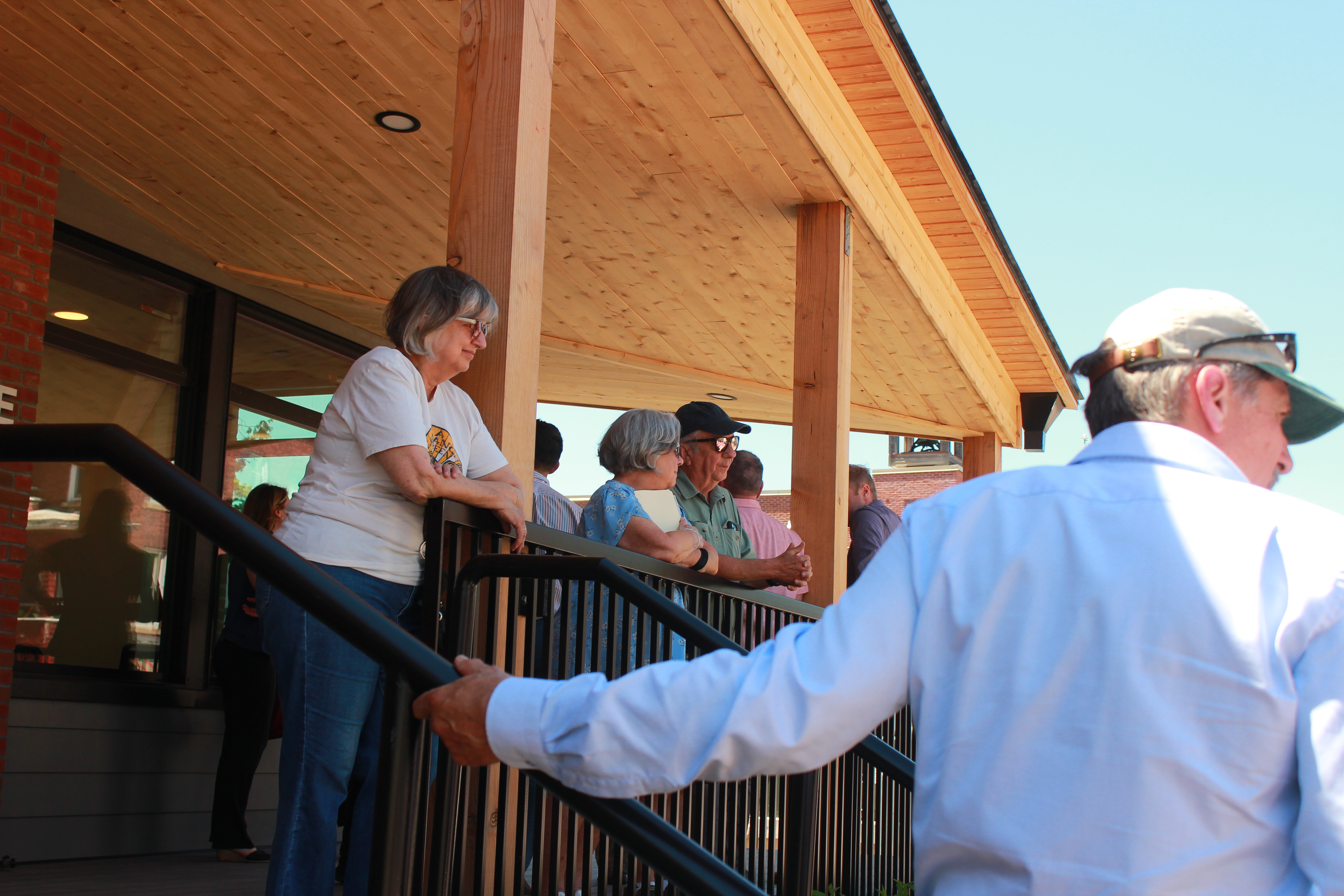 Image of folks enjoying the front porch at Marsh House