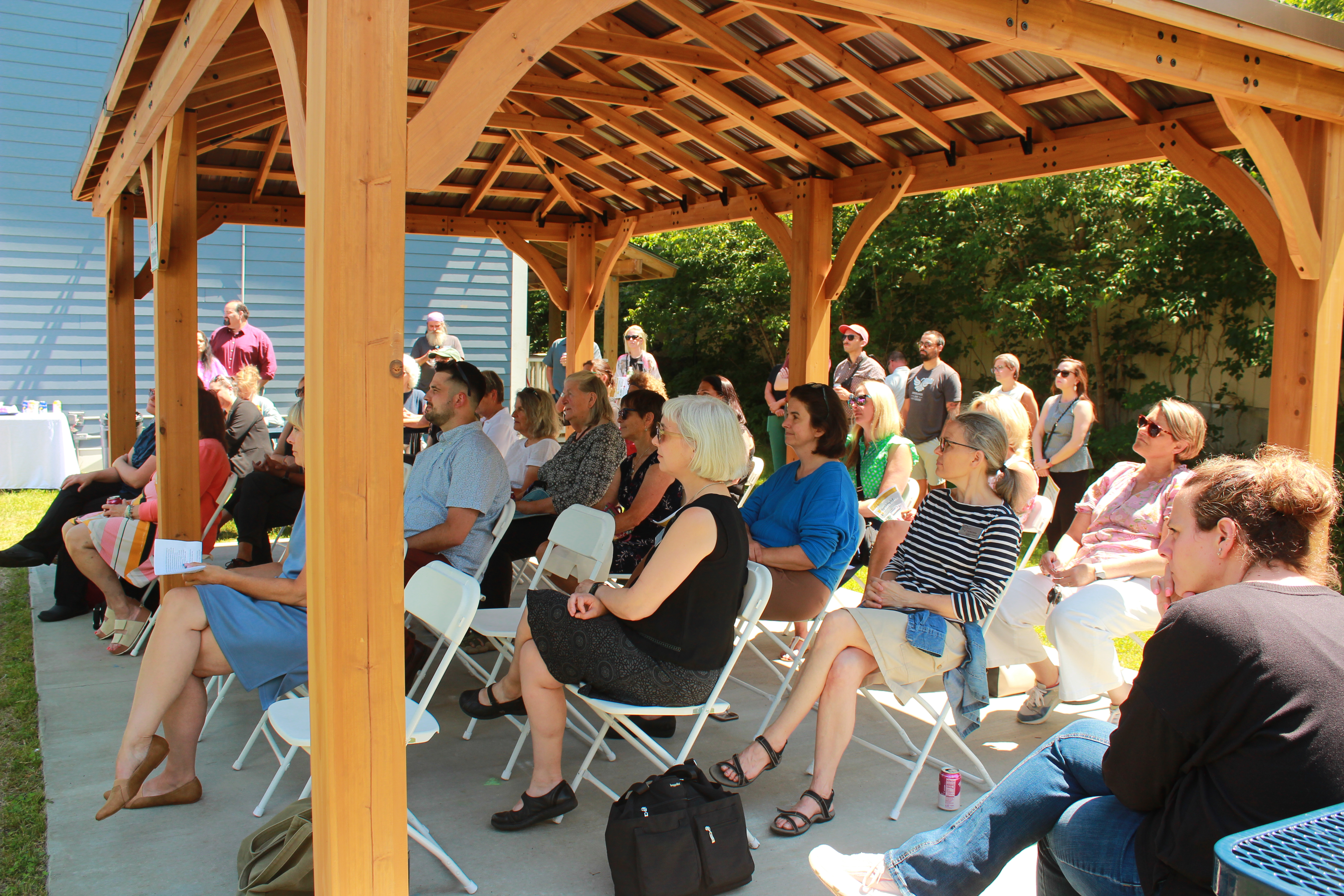 Image of folks at a Downstreet Grand Opening 