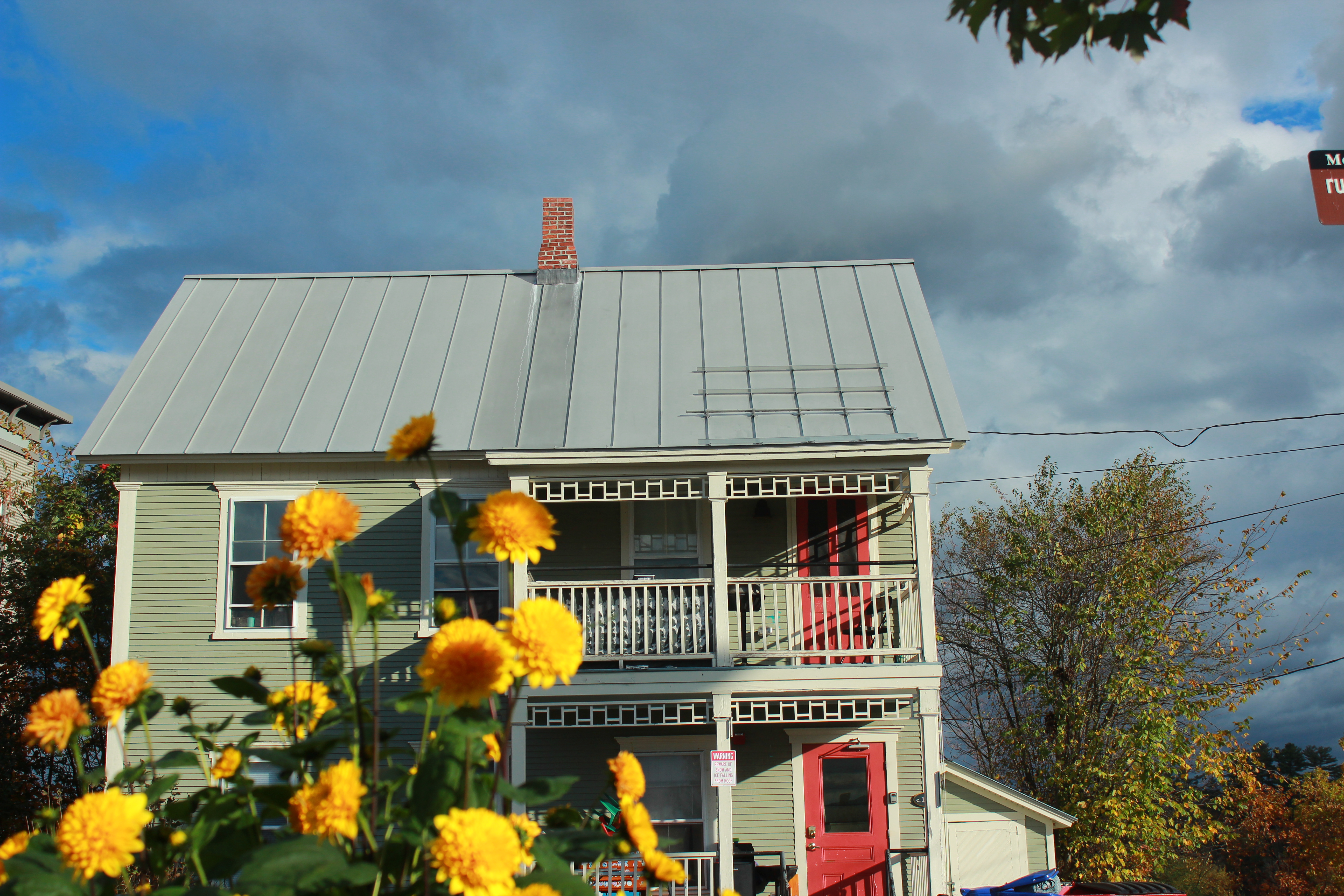 Image of flowers in front of a Morrisville home